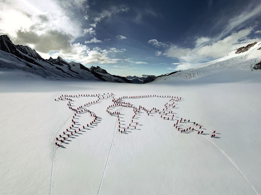 Hundreds Of Mountaineers Scale The Alps For Epic Photoshoot