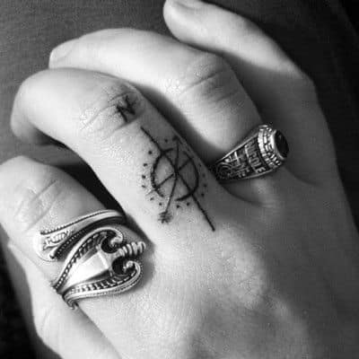 Arrow Compass Finger Tattoo Design