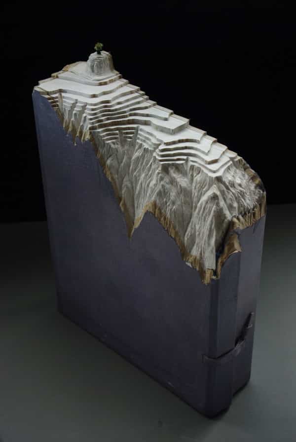 Carved Book Landscapes by Guy Laramee sculpture recycling paper books 