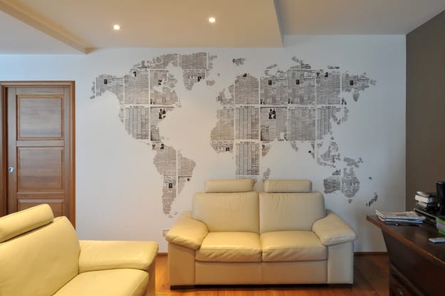 Use newspaper to make a wall design, like a map.