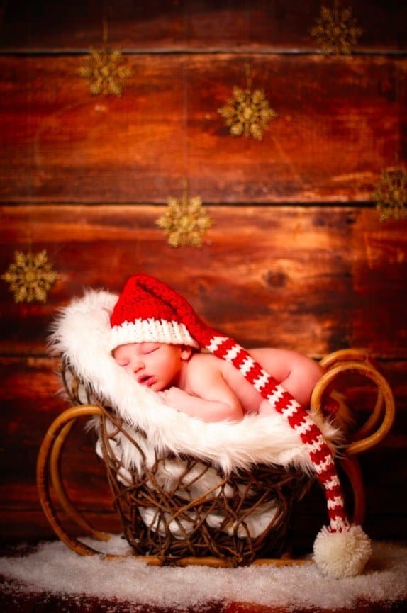 This baby in a sleigh: