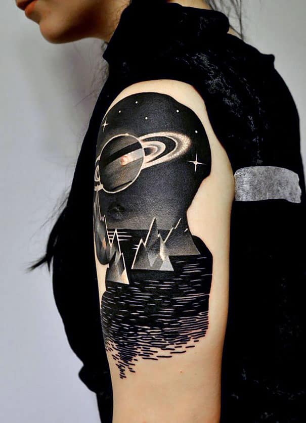 space themed tattoo