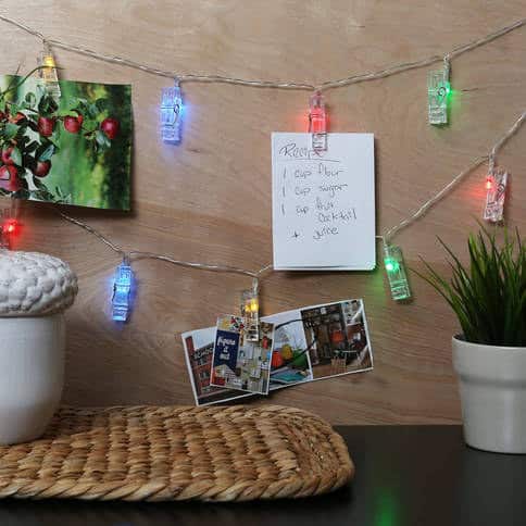 Illuminate your favorite snapshots by pinning them to fairy lights.