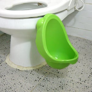 A kid&#39;s urinal makes potty training a little more bearable.