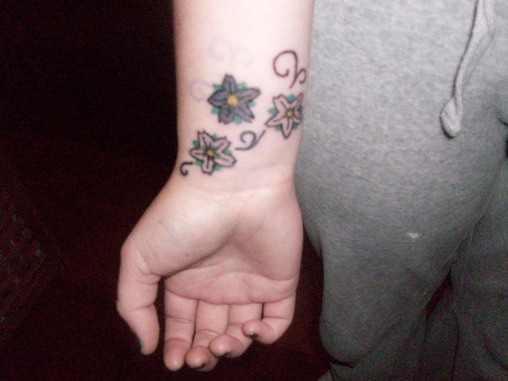 sherry blossom tattoo 43 Inspiring Wrist Tattoos and Graphics