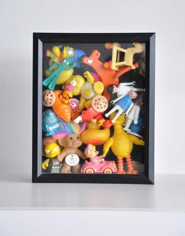 Can't bear to part with your child's old toys? Keep them out of the way (and on display) in a shadow box.
