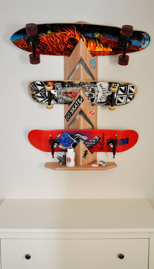 Skateboards on the floor are a legitimate safety hazard: shelf them (it's safer, plus it shows off the deck artwork).