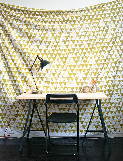 Or just give off a wallpaper effect, with this geometric wall hanging.
