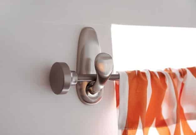 If you need an easy way to hang a curtain rod, use Command hooks.