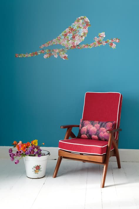 Use scrapbooking paper to make a bird-shaped decal.