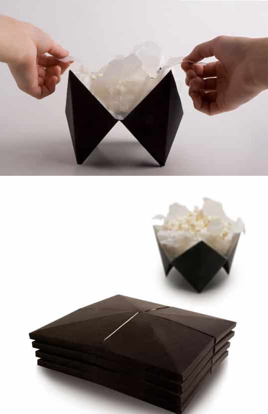 An origami microwave popcorn design that folds out into a bowl.