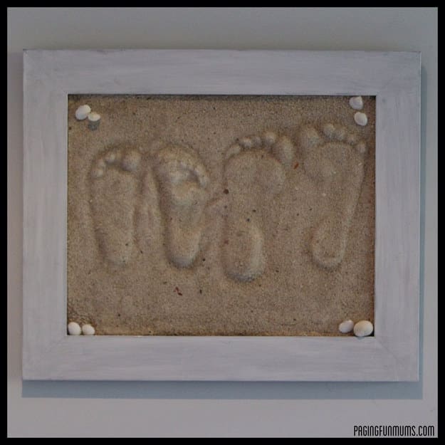 Framed sand footprints.