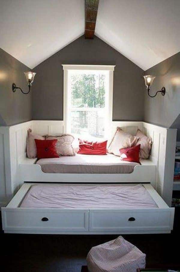 Level up a window seat by adding a trundle bed.