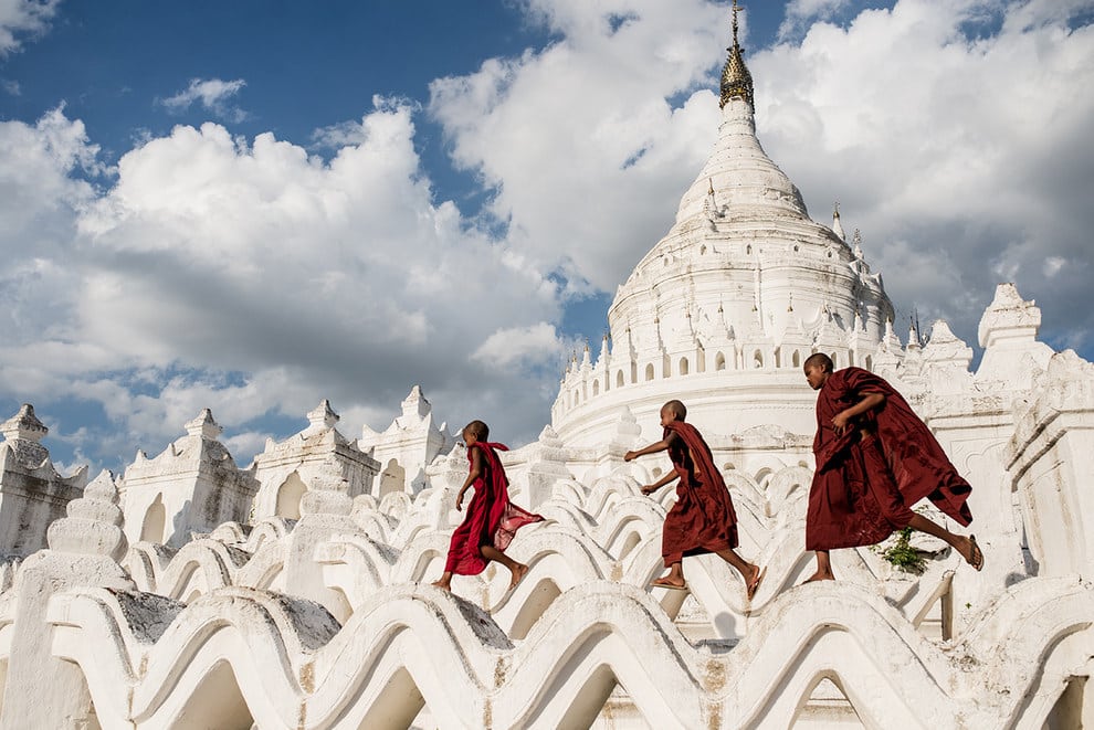 Young Buddhists play on the Hsinbyume Pagoda, Myanmar, after the tourists have left for the day.