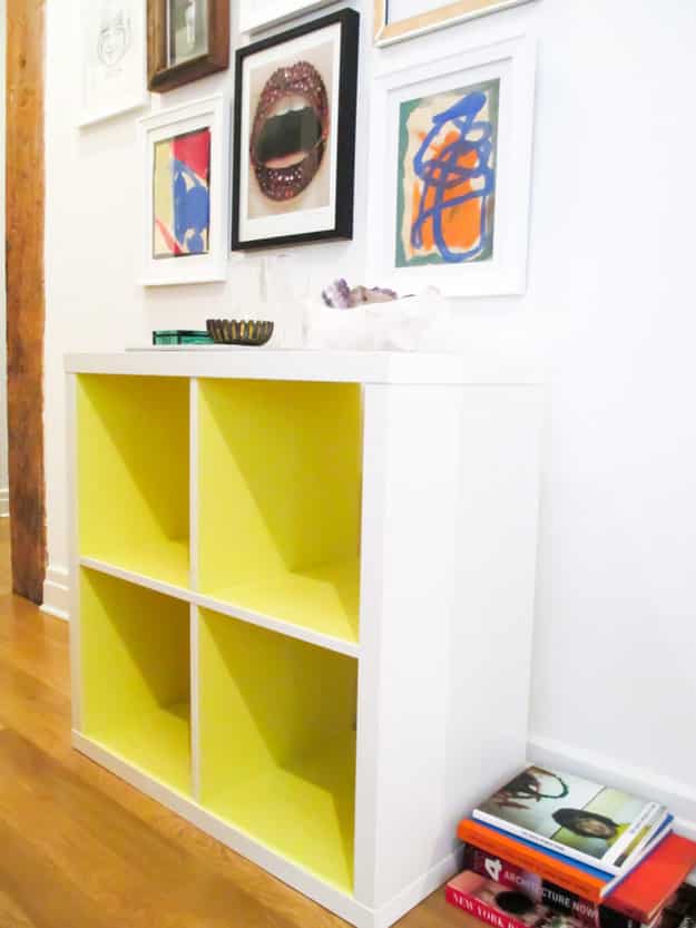 Add color to the insides of your Kallax shelves if you want to liven up a room.