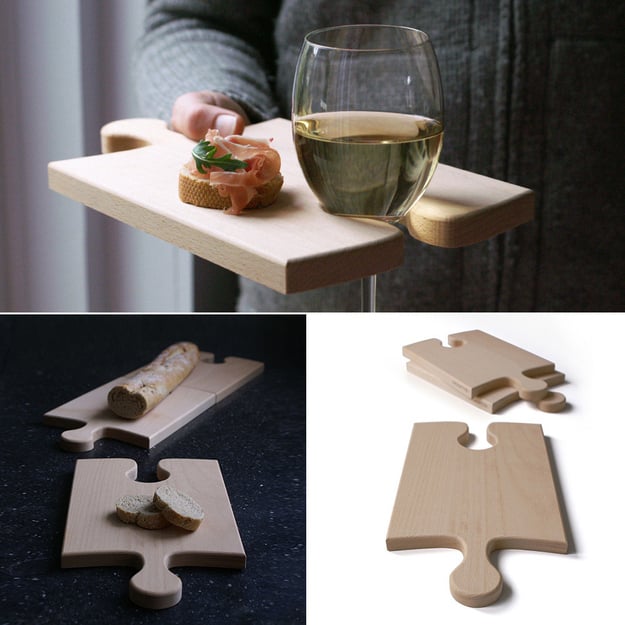 The Puzzleboard can be a wine-holding plate, a cutting board, or an interlocking serving piece.