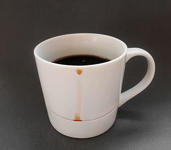 An insanely simple design for a coffee cup that catches all the drips.
