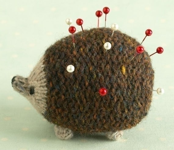 Make a pincushion hedgehog from leftover yarn.