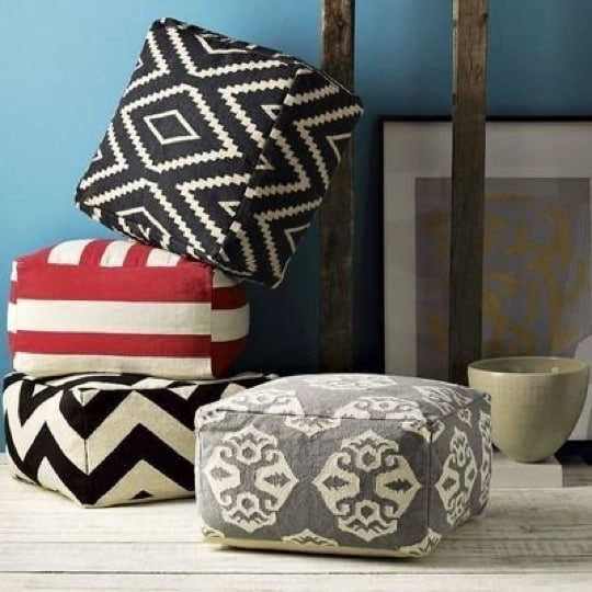 Make your own West Elm floor poufs from $3 IKEA rugs.