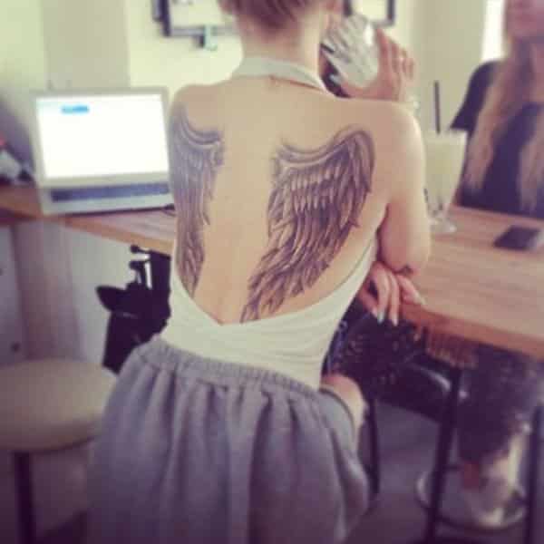 Wing back tattoo - 35 Breathtaking Wings Tattoo Designs | Art and Design 