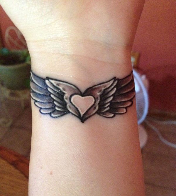 Wing wrist tattoo - 35 Breathtaking Wings Tattoo Designs | Art and Design 