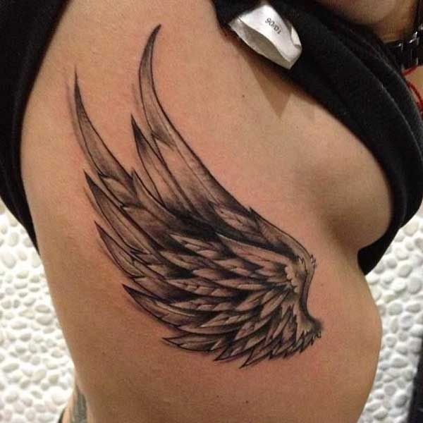 Wing side tattoo - 35 Breathtaking Wings Tattoo Designs | Art and Design 