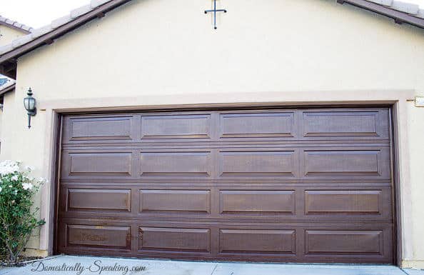 Wood stain your aluminum garage door for a more rustic feel.