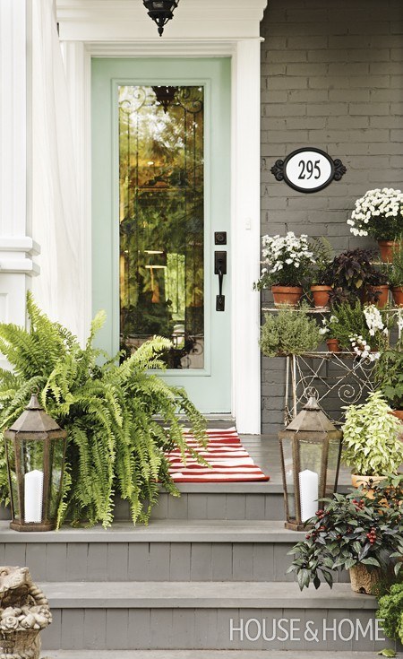 Adding layers of plants will give more dimension to your porch.