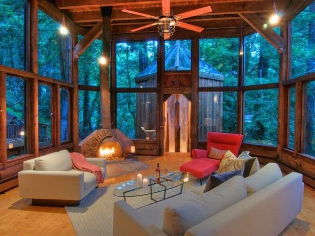 Cool summer nights would look so much better from a glass room like this one.