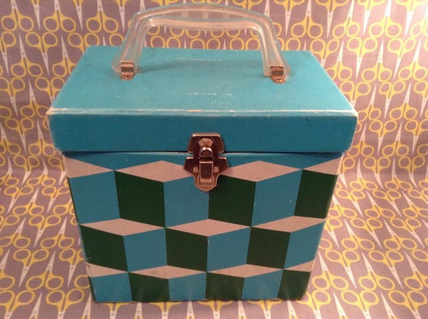 If you don't have a huge collection and are looking for something funky, vintage record boxes can be found on Etsy.