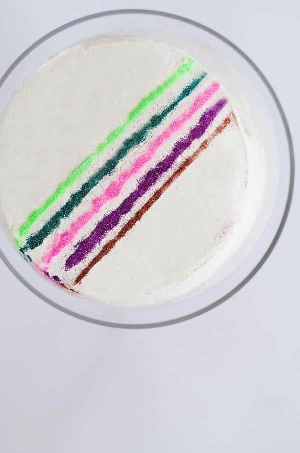 Make stripes with edible glitter for a cake that sparkles.