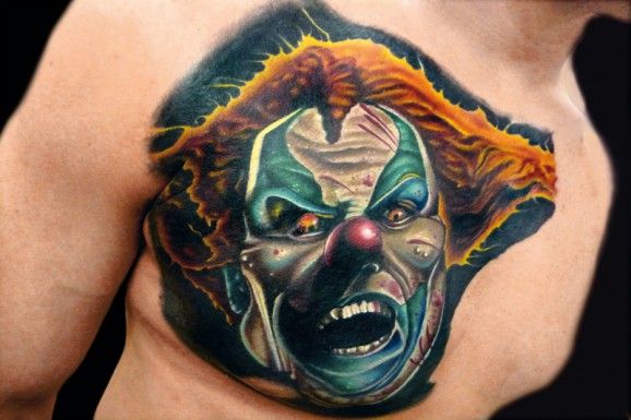 Creepy clown tattoo done by Brandon Bond. 