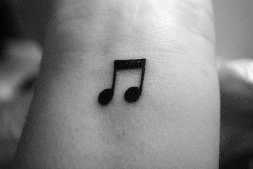 Musical notes tattoo hi-res stock photography and images - Alamy