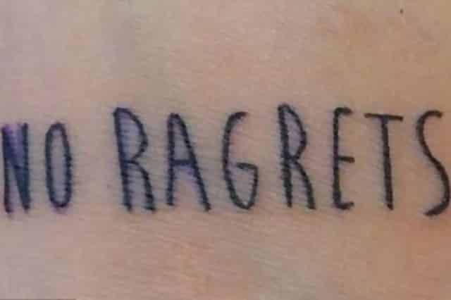 A small tattoo which says “No ragrets” instead of “No regrets”