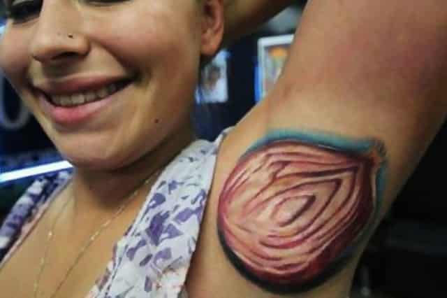 A woman has had a picture of half an onion tattooed on her armpit 